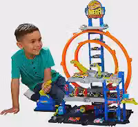 Kit Pista Hot Wheels Mega Garagem Mattel. Conjunto com elevador e estacionamento para vários veículos. Diversão e corridas para crianças a partir de 4 anos.